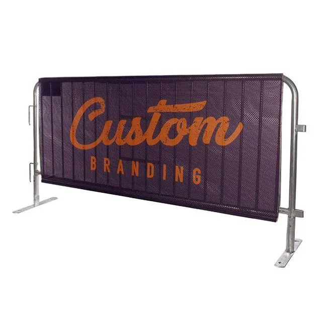 Real open-face printed barrier cover shown attached to a crowd-control barrier
