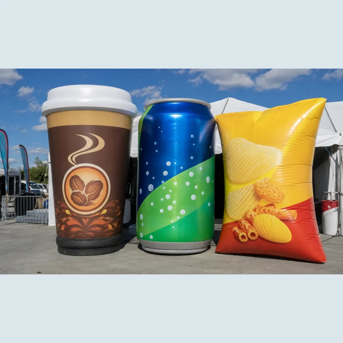Oversized inflatable beverage and snack-package replicas for an event activation