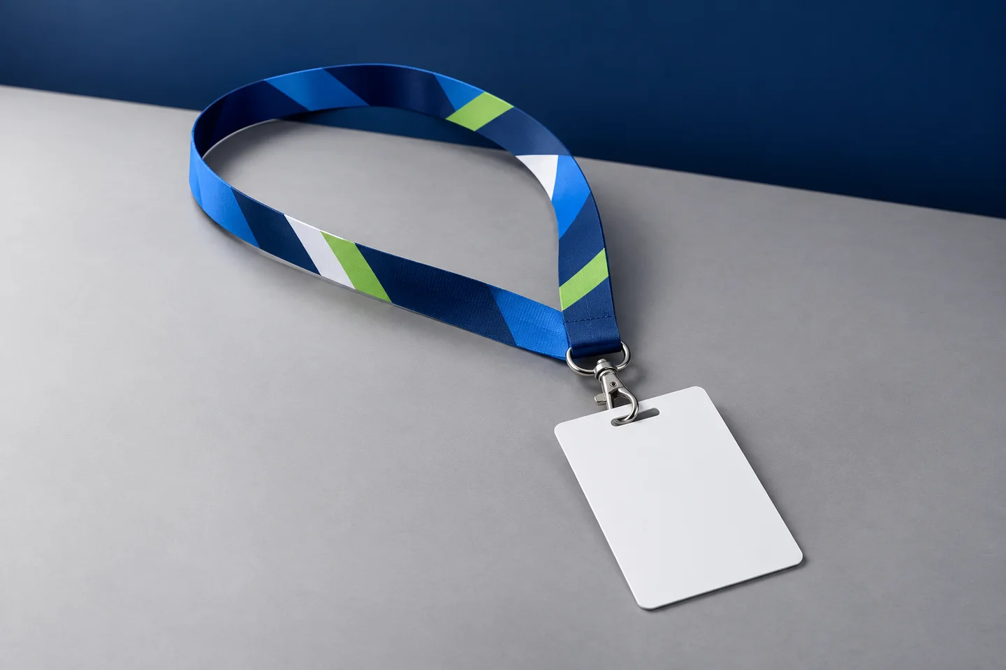 Neutral custom event lanyard concept with abstract graphics and a blank badge card