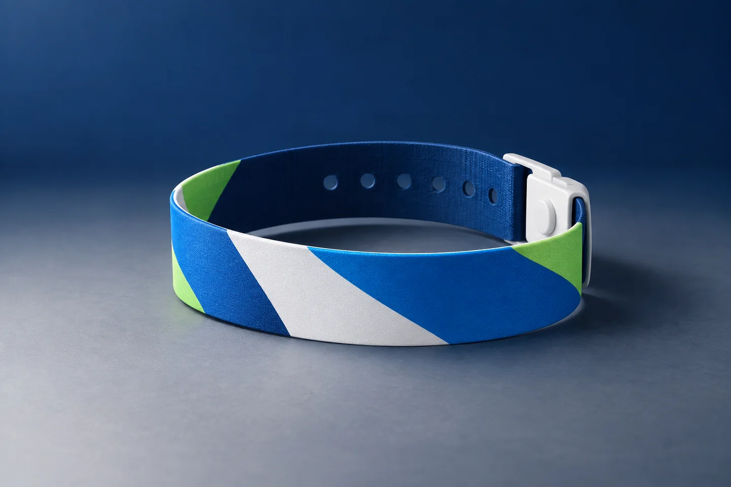 Neutral custom event wristband concept with abstract blue, white and green artwork
